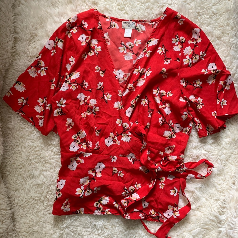 Red floral wrap top